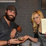 Conrad Meurice and Emily Blewett with their cocktail.