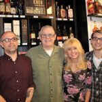 Store Owners Keith, Kevin and Donna Ploski and employee Timmy Chapman.