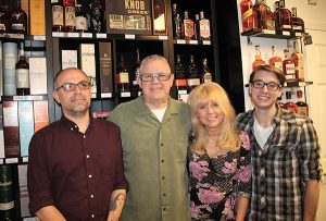 Store Owners Keith, Kevin and Donna Ploski and employee Timmy Chapman.