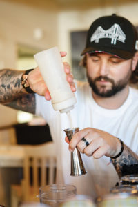 Tyler Bernadya creating the winning cocktail, Castaway Coolada.