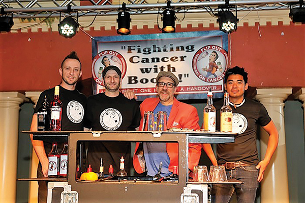 June 6 Competition Winner Colby Ashton of Las Vegas; Opie Oppenheimer, Event Organizer, Flip Out on Cancer; Frank Martucci, Director of Beverage Operations, Twin River Casino; Second place Ram Ong of Miami.