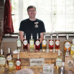 Tom Dubay, Co-owner, Hartford Flavor Company showcasing Wild Moon Liqueur.