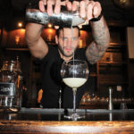 USBG CT chapter member and Bartenders Academy Instructor Dave Cohade behind the bar GinFest Hartford.