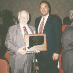 Julius Rosenberg, shown with son Jerry Rosenberg, was honored with “Industry Person of the Year” in 1994 from the Connecticut Package Store Association (CPSA).