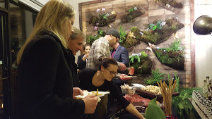 Guests sampling hors d’oeuvres.