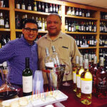 Milton Monzon, Regional Account Manager, with Bob Russell, Owner, Wayland Square Fine Wines and Spirits.