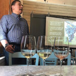 Wine pours next to Angelos Iatridis, Winemaker, Alpha Estate