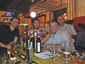 Krust Bartender Neil Robinson; Krust Owner Kevin Wirtes; Madison Vestergaard; Curious Cork’s Danny Keefe; and Cellar Fine Wines Sales Representative Rich Veilleux “moments before their World Cup dreams were crushed.”