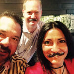 Ray Collins, Sales Representative, Brescome Barton; Gary Dritschler, State Manager, Campari America; Veronica Saurett, Account Development Manager, Brescome Barton, all wearing the Campari mustache.