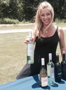 Donna Taylor, Vine Ventures, with Noble Wines. Sav-Rite Liquors of North Haven sponsored the tasting placement.