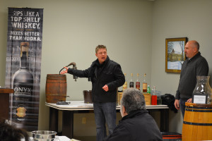 Adam von Gootkin demonstrated how moonshine is made. Jeff Cornelius, Off-Premise Brand Manager for CT and RI looks on