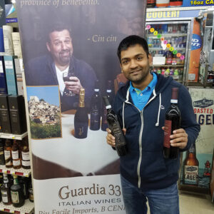 Neil Patel, Owner, Thompson Liquors, showcasing Guardia 33 wines. 