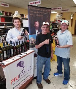 Village Wine & Liquors Employee Lou Tarantino with Ed Della Vecchio, Sr. and Ed Della Vecchio, Jr., Owners, Village Wine & Liquors in Monroe