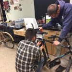 Project Broken Wheel volunteers prepared bikes for the upcoming holiday drive.