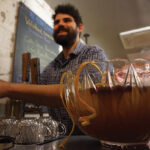 Benjamin Terry, Bartender, New Harvest Coffee and Spirits next to his Prohibition Punch. Terry is the newly-appointed USBG RI Chapter Treasurer.