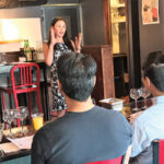 Monica Samuels, Sake Master and National Sales Manager, Vine Connections presenting to guests.