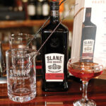 Slane Irish Whiskey is golden in color with complex fruit, caramel, brown spice and toasted oak on the nose. The taste is “spicy at first, then sweetened with vanilla and butterscotch with lingering hints of dry fruit and caramelized sugar on the finish.”