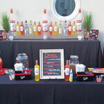 Stoli Crushed Ruby Red Grapefruit and Pineapple, made with real fruit juices on display. 