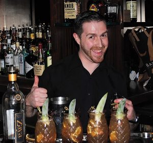 Max Cuscuna of Hudson Grille next to his winning cocktail during the competition on April 24.