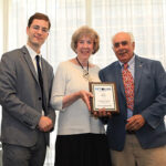 Kyle Swartz, Managing Editor, Beverage Dynamics with Donna and Frank Celico, Owners, The Wine Store in Westerly accepting their award as one of the 2017 “Retailers of the Year.”