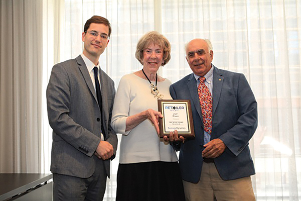 Kyle Swartz, Managing Editor, Beverage Dynamics with Donna and Frank Celico, Owners, The Wine Store in Westerly accepting their award as one of the 2017 “Retailers of the Year.”