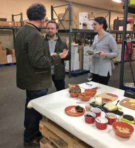 Steve Wynn, Founder of The Wine Bros., talking with Matthew MacCartney, Executive Chef, Jamestown Fish and Emily Brakenhoff of Jamestown Fish. 