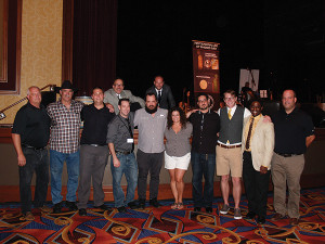Judges and competitors: Front row: Don Jean, Brand Manager, Brown-Forman; Fred Smerlas, Proprietor, Fred & Steve’s Steakhouse; Bistro 9 Bartender Perry Miller; The Dorrance’s Vito Lantz; Jesse Hedberg of Justine’s/Local 121; Kelly Adams of The Boathouse; Anthony Guaetta of Lighthouse Barat Twin River Casino; Silas Axtell, Head Bartender at (soon-to-open) Townsman in Boston; Peter Lloyd Clayton, Owner, Bartenders Academy in Connecticut; and Johnson & Wales faculty member, Brian Warrener. Back row: Frank Martucci and award-winning New York bartender, Chris Cardone.
